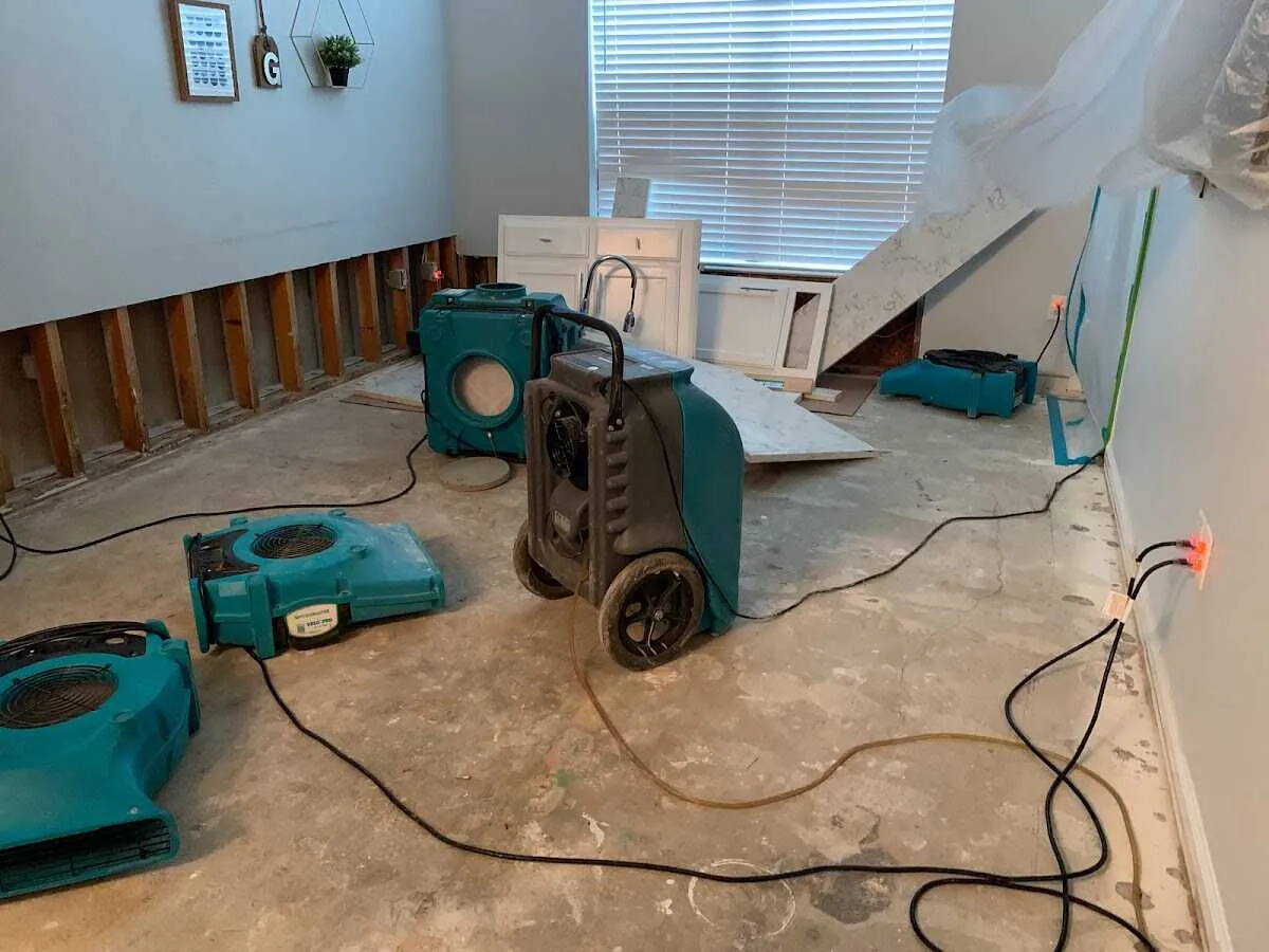 Dehumidifier in flood-cut room for Water Damage Restoration in Westmont
